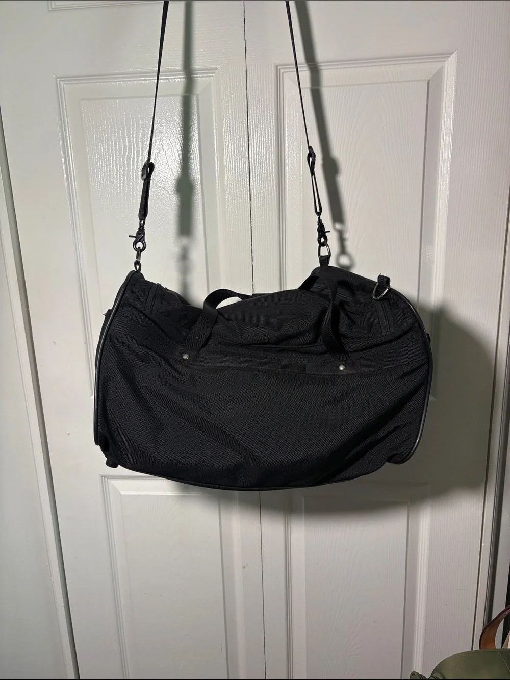 Hartmann zip around nylon and leather duffle style bag.